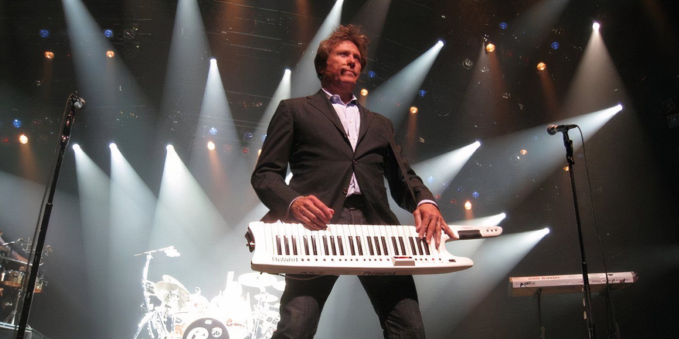 Robert Lamm plays a piano on stage in Now More Than Ever The History of Chicago.