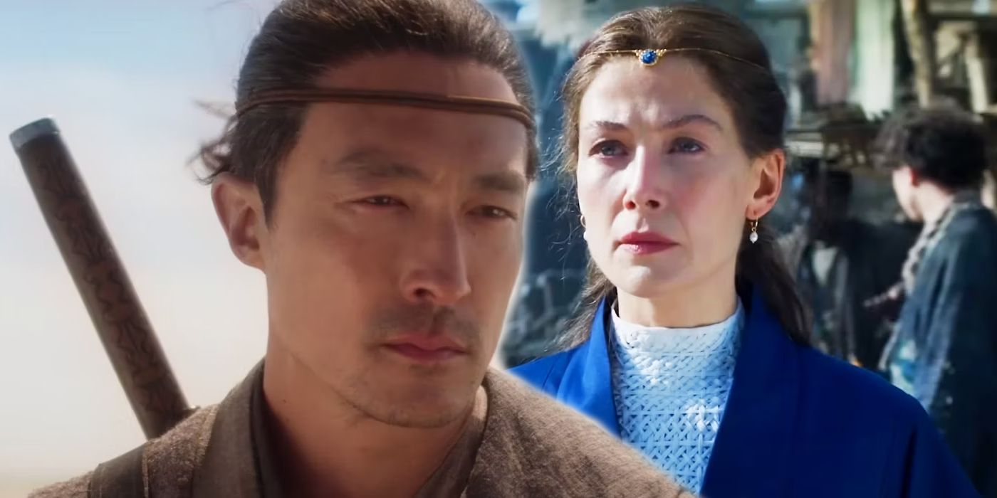 Daniel Henney as Lan looking serious and Rosamund Pike as Moiraine looking serious in The Wheel of Time season 2