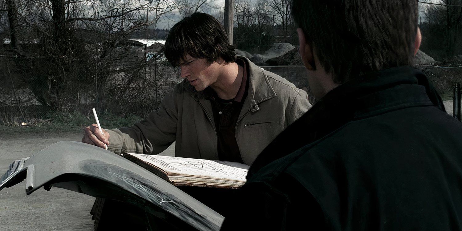 Sam (Jared Padalecki) and Dean Winchester (Jensen Ackles) investigate a book in Supernatural Devils Trap