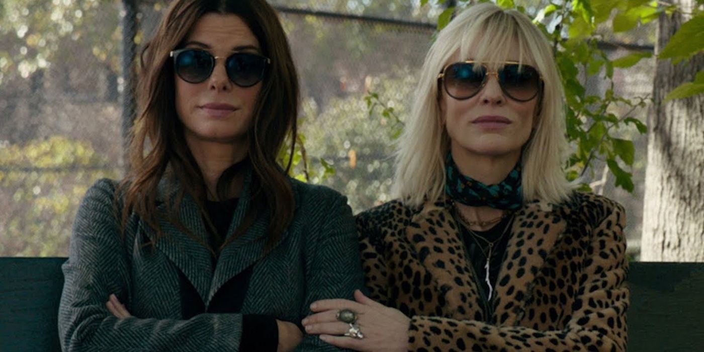 Sandra Bullock and Cate Blanchett standing side by side in Ocean's Eight