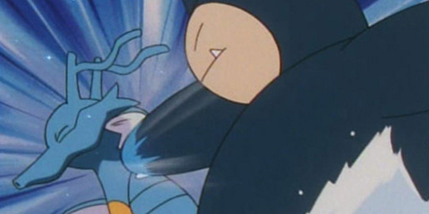 Ash's Snorlax punches Clair's Kingdra in a gym battle