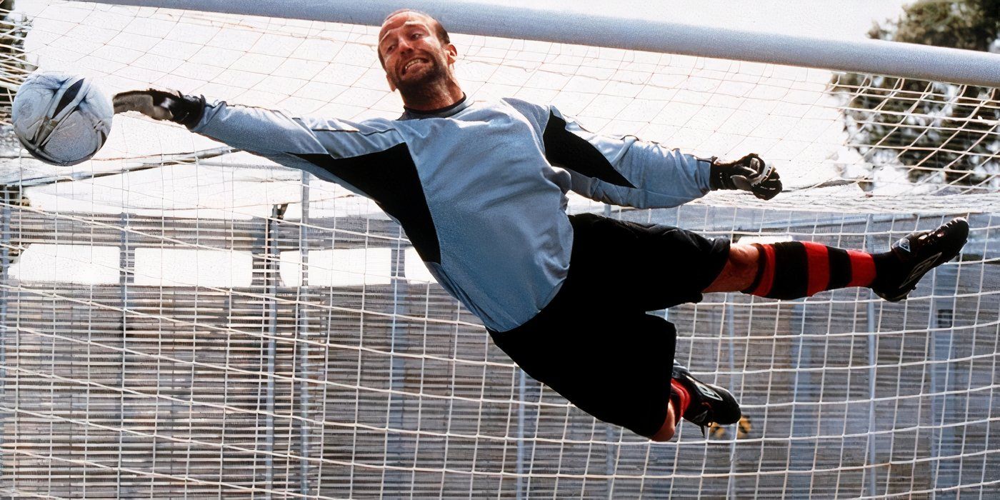Jason Statham as Monk diving for a football in Mean Machine