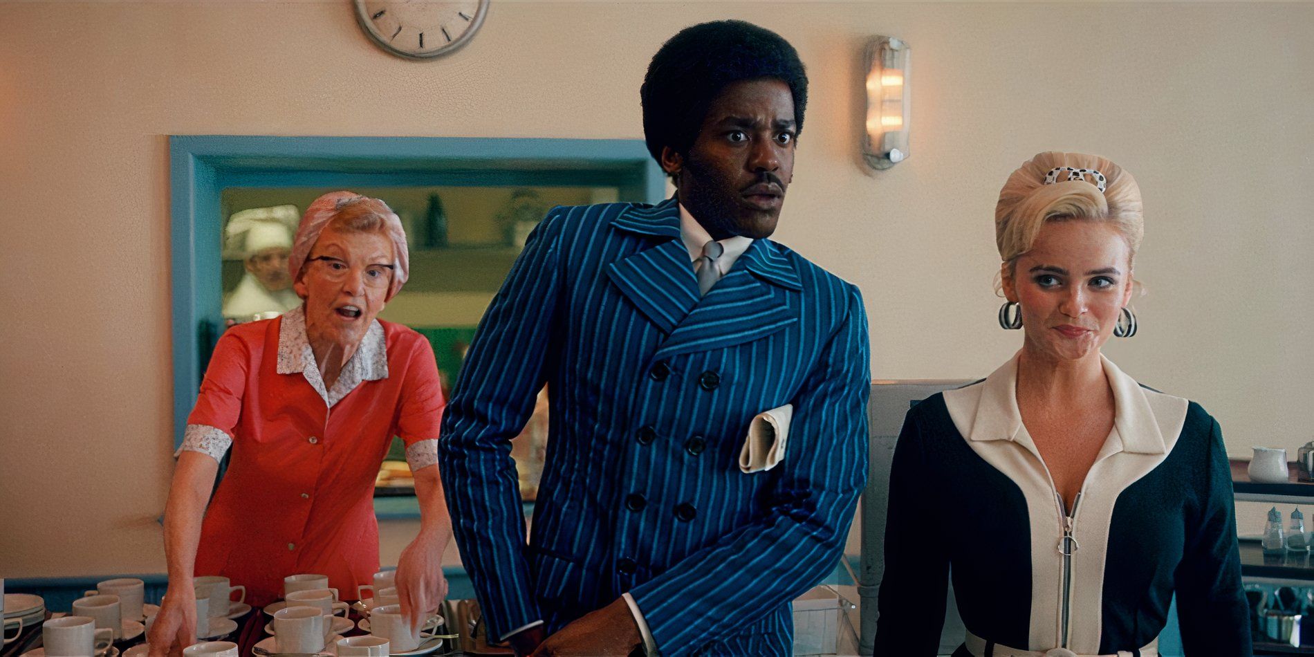 Susan Twist, Ncuti Gatwa, and Millie Gibson in standing in the cafe in Doctor Who.