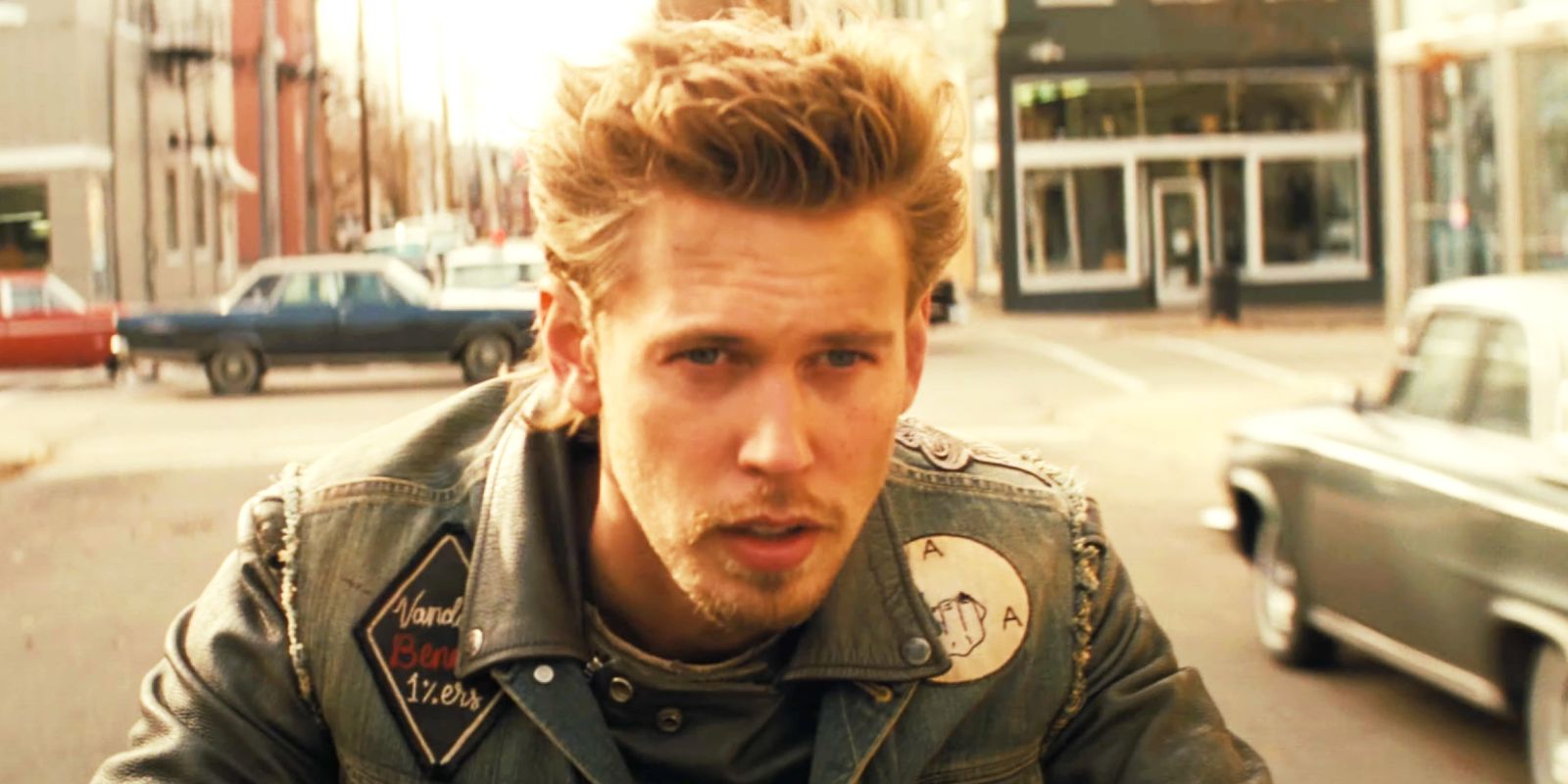Austin Butler riding a motorcycle as Benny in The Bikeriders