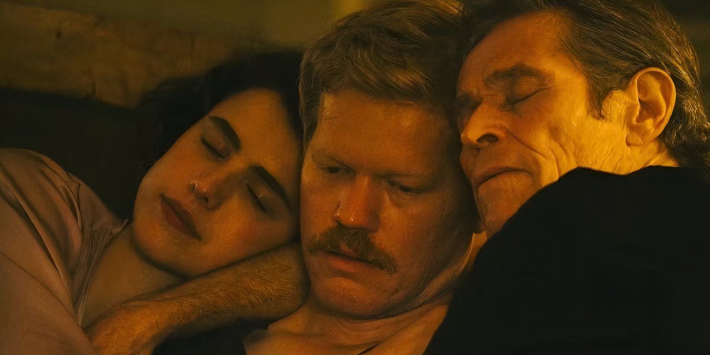 The cast of Kinds of Kindness hugs each other in movie still