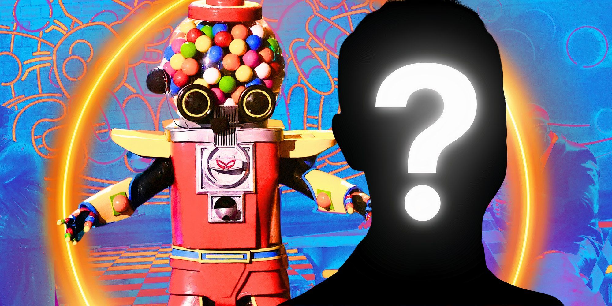 The Masked Singer's Gumball with his arms outstretched standing next to a mystery man.