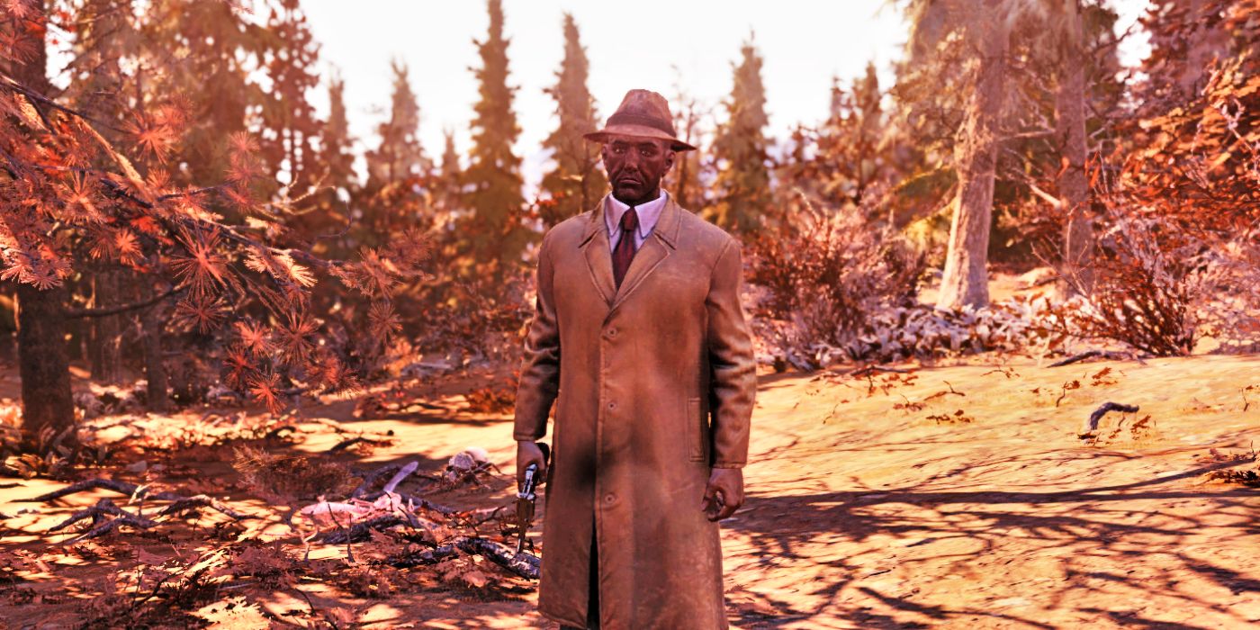 The Mysterious Stranger, a man in a trench coat with a revolver at his side, stands in a forest in a screenshot from Fallout 4.