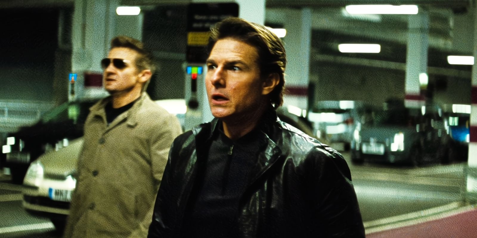 Tom Cruise as Ethan Hunt and Jeremy Renner as Brandt in Mission Impossible Rogue Nation