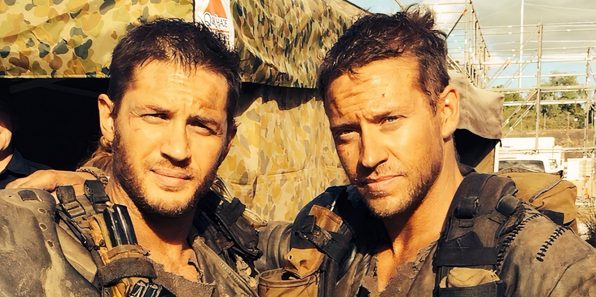Tom Hardy and Jacob Tomuri stand next to each other on the set of Mad Max: Fury Road
