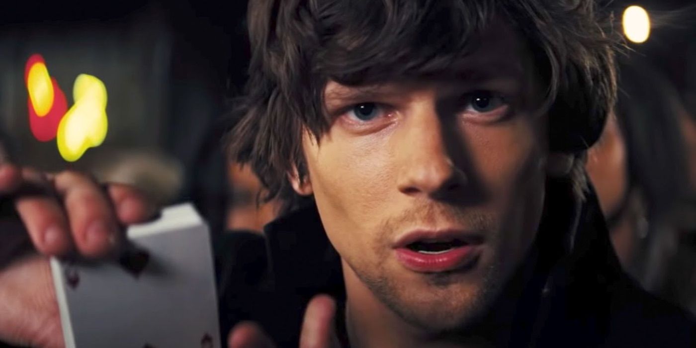 Jesse Eisenberg holding a deck of cards in Now You See Me