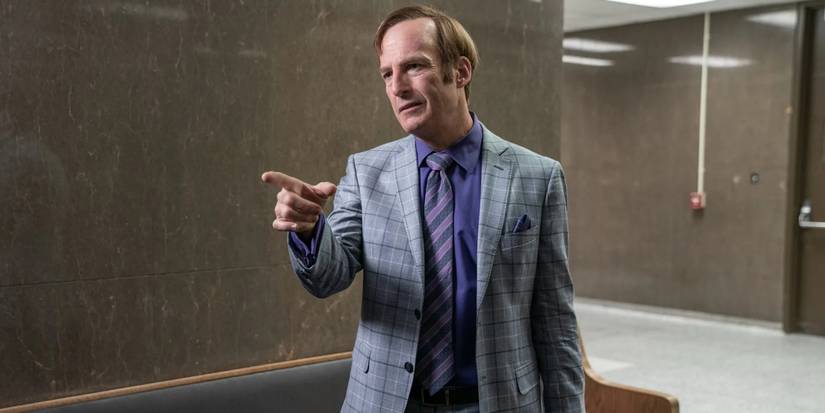 Bob Odenkirk wearing a suit and pointing as Saul Goodman in the Breaking Bad spinoff Better Call Saul