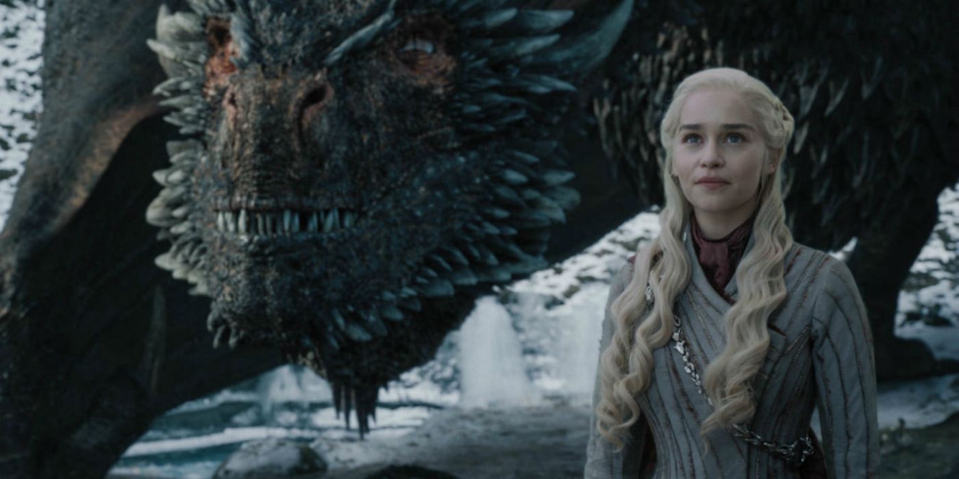 Emilia Clarke as Daenerys Targaryen next to Drogon in Game of Thrones season 8