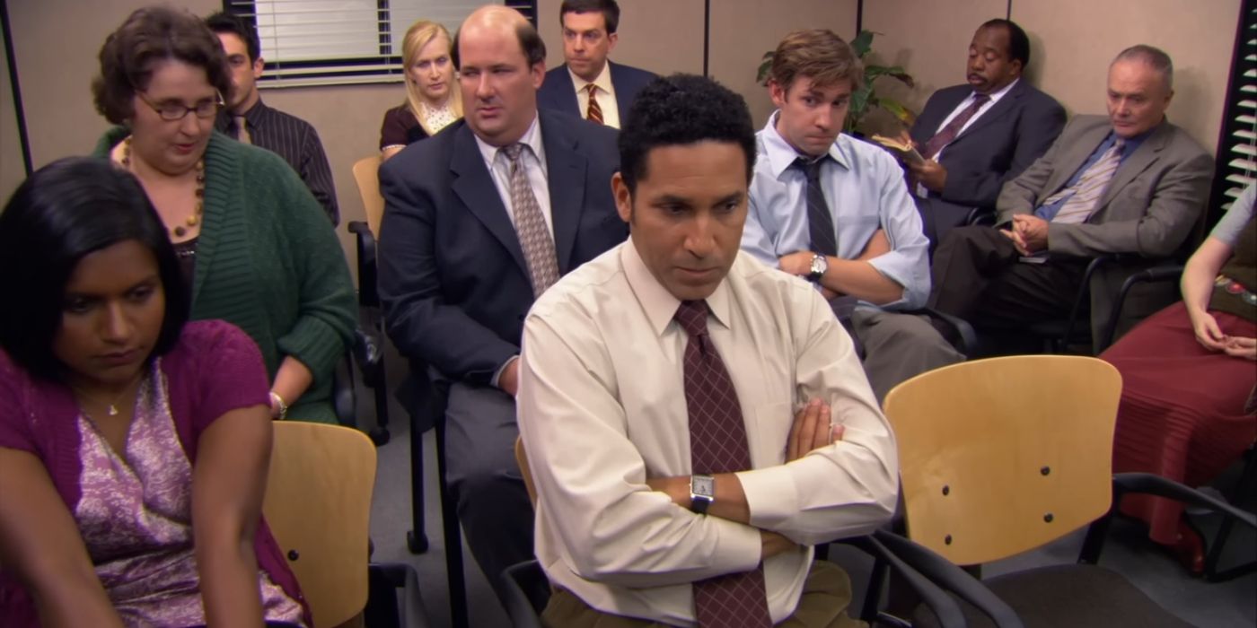 The workers gathered in the conference room for Holly's ethics meeting in The Office episode Business Ethics