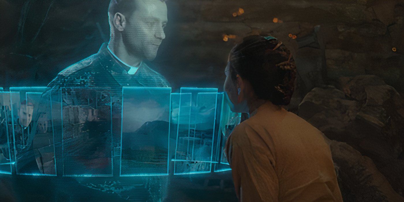 Splice looking at the hologram of her father, John Vater, and their shared memories in the Doctor Who episode Boom