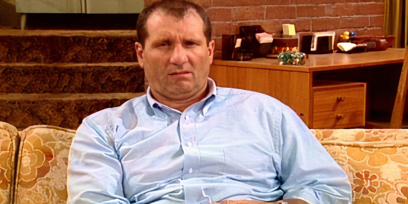 Ed O'Neill as Al Bundy looking grumpy on the couch in Married with Children.