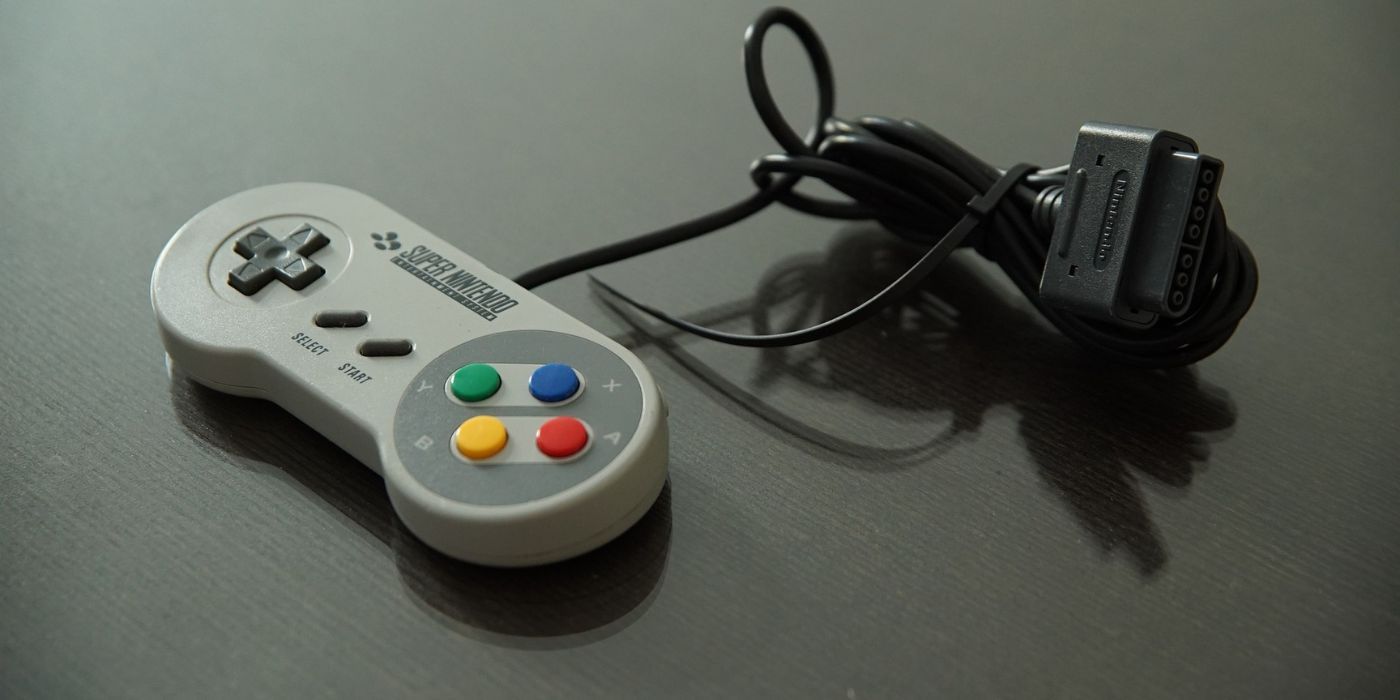 Um controlador SNES e seu cabo