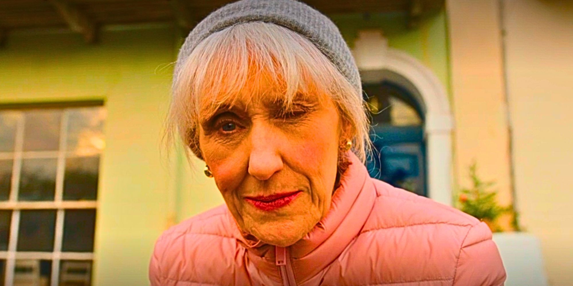 Anita Dobson winking as Mrs. Flood in Doctor Who
