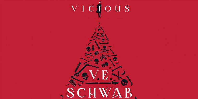 The cover of Vicious by V.E. Schwab featuring the title with Victor Vale walking behind it and a pile of bones