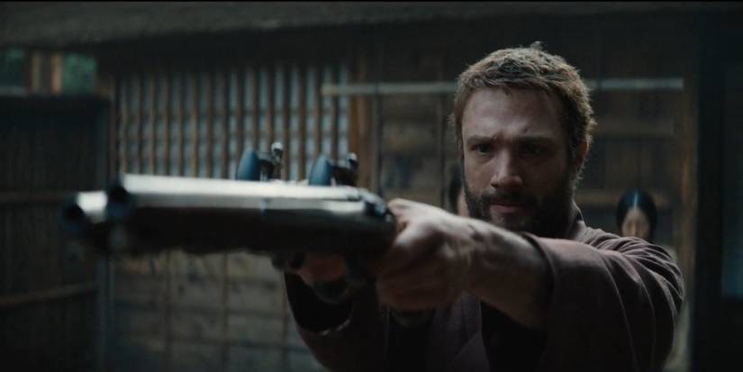 Cosmo Jarvis as John Blackthorne holding his guns in Shogun Chapter Four: The Eightfold Fence