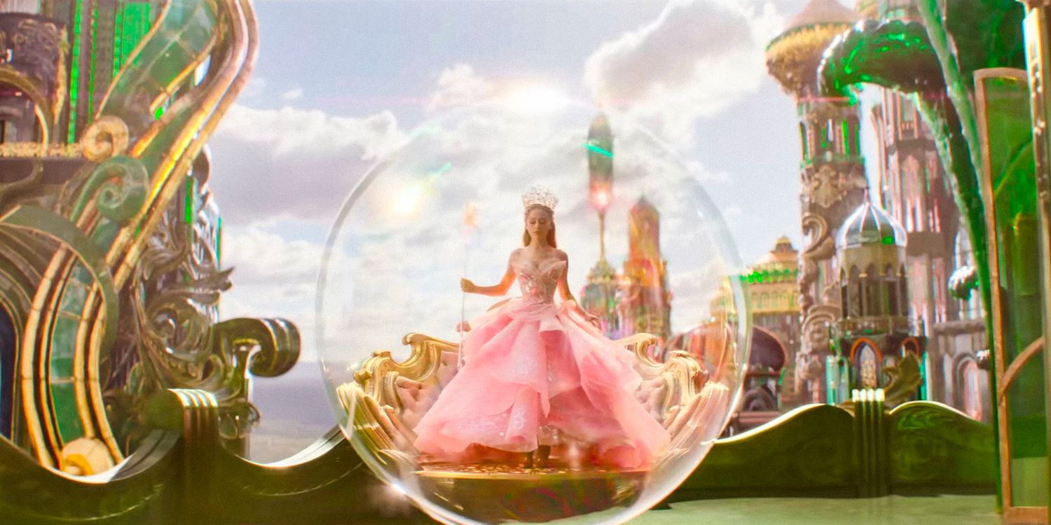 Glinda (Ariana Grande) em um vestido rosa dentro de uma bolha em Wicked 