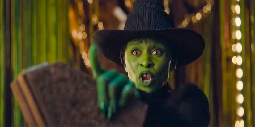 Cynthia Erivo as Elphaba with an expression of fear and concern in Wicked 