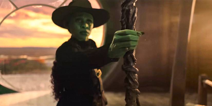 Elphaba (Cynthia Erivo) gripping her magical broom tightly in Wicked