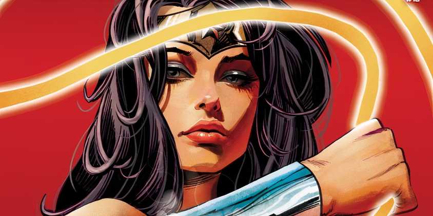 Comic book art: a close up of a sultry looking Wonder Woman swinging her lasso.
