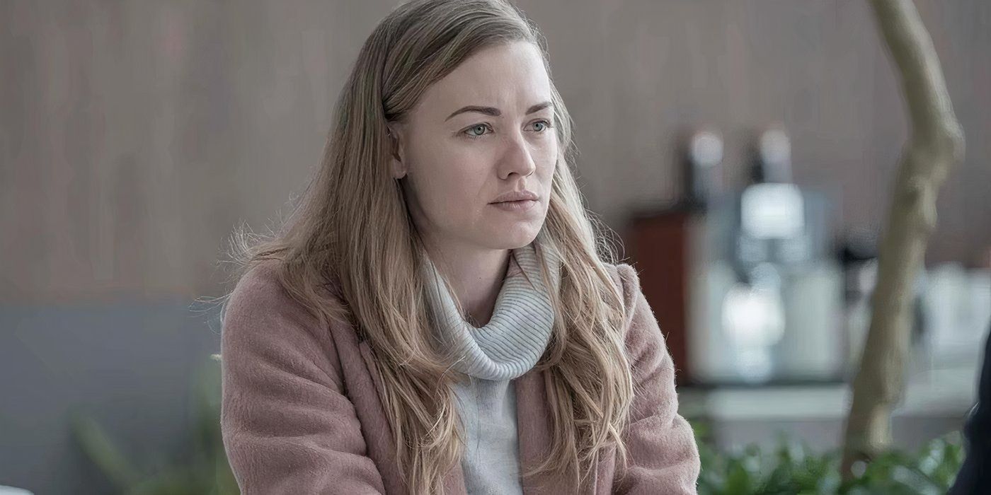 Yvonne Strahovski as Serena Joy looking serious in plain clothes in The Handmaid's Tale