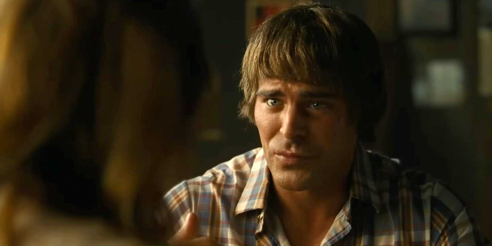 Zac Efron as Kevin Von Erich looking sad in The Iron Claw 