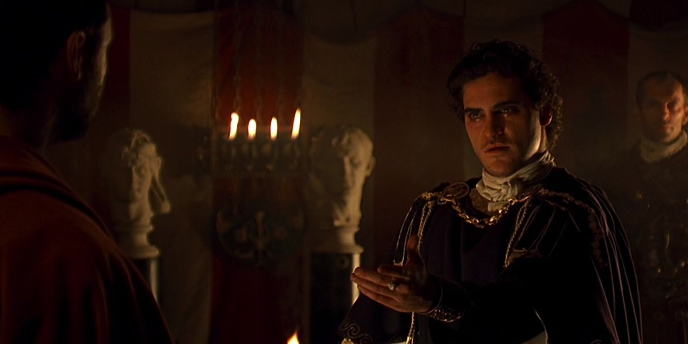 Joaquin Phoenix as Commodus extending his hand in Gladiator
