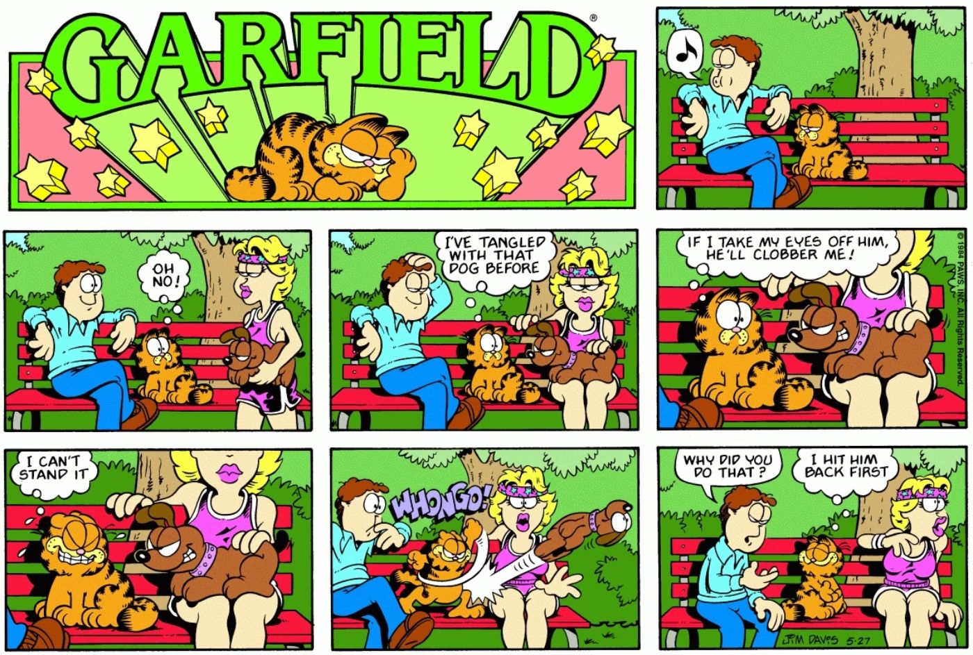 Garfield bullying a random dog in the park.