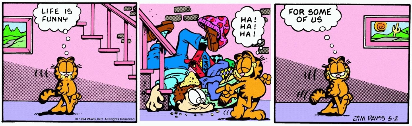 Garfield laughing at Jon falling down the stairs.