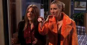 A shocked Phoebe and Rachel look out the window in Friends