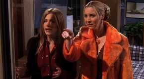 A shocked Phoebe and Rachel look out the window in Friends
