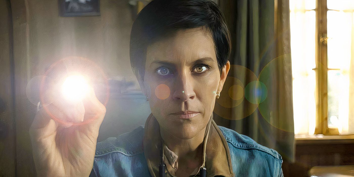 Annabeth Gish looks serious with flashlight in Midnight Mass