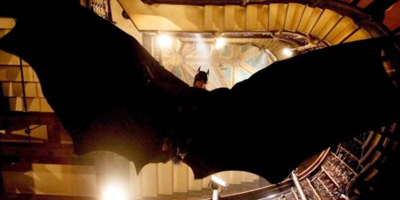 Batman Gliding Down Stairs In Batman Begins