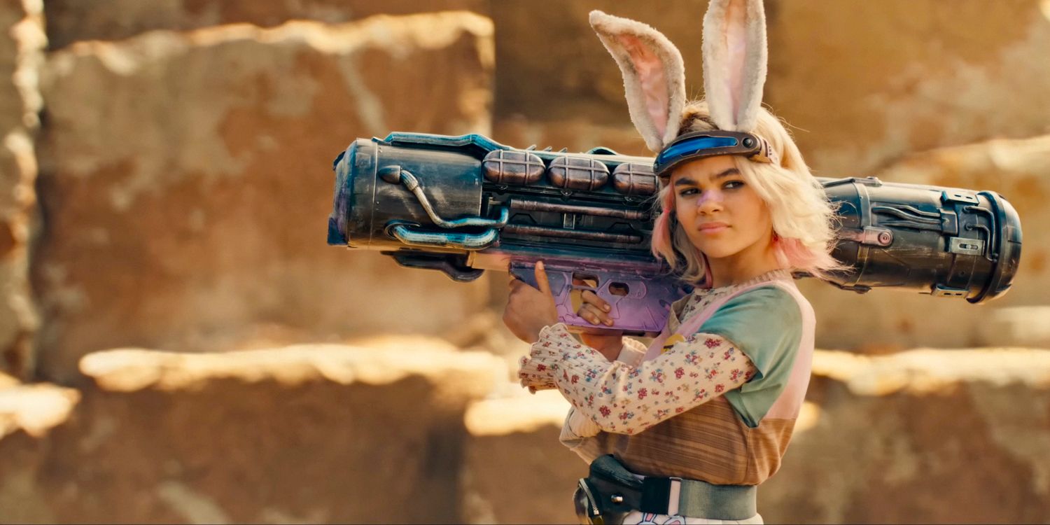 Tiny Tina (Ariana Greenblatt) segurando um lançador de foguetes em Borderlands