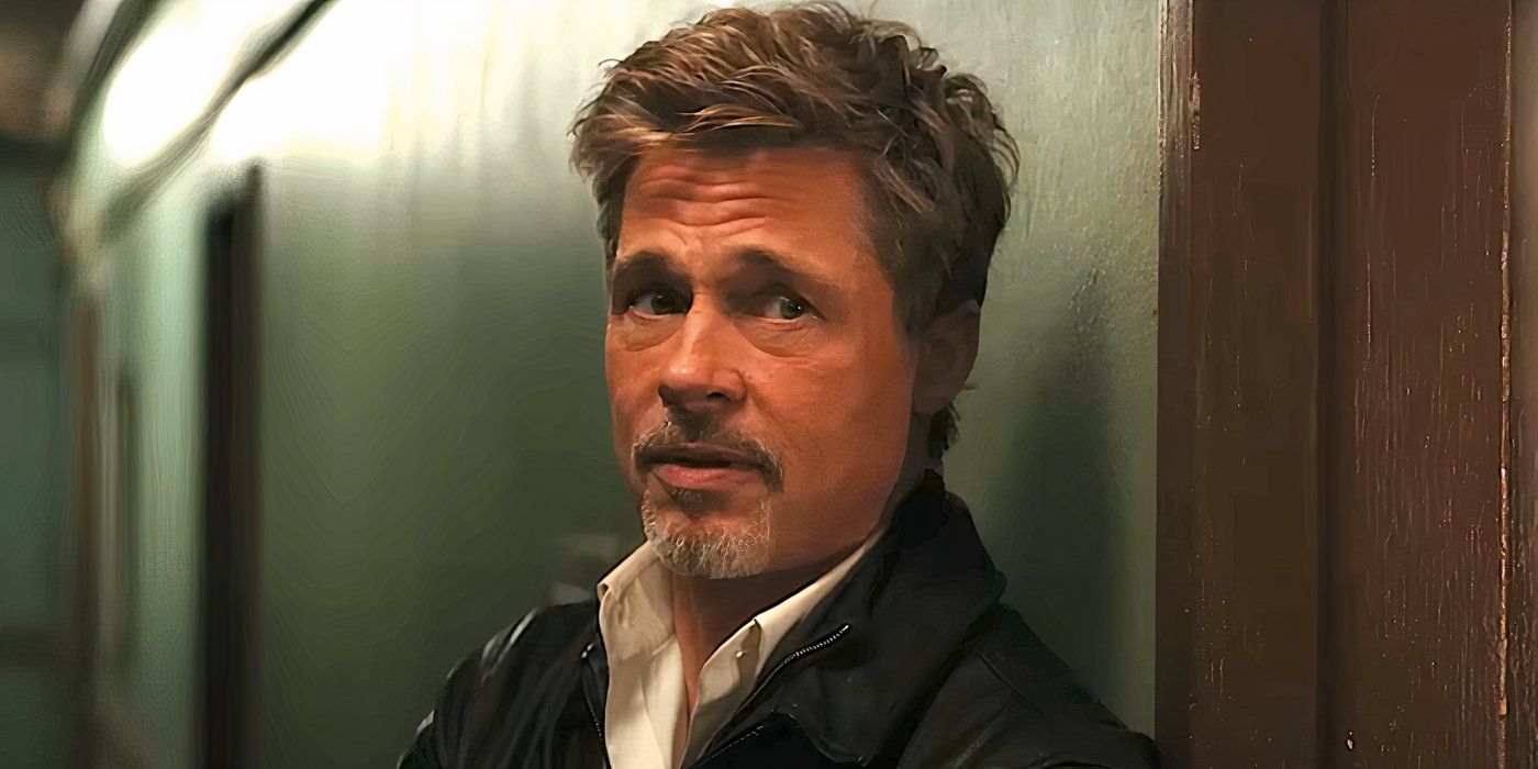 Brad Pitt's character looks concerned in Wolfs trailer 2024