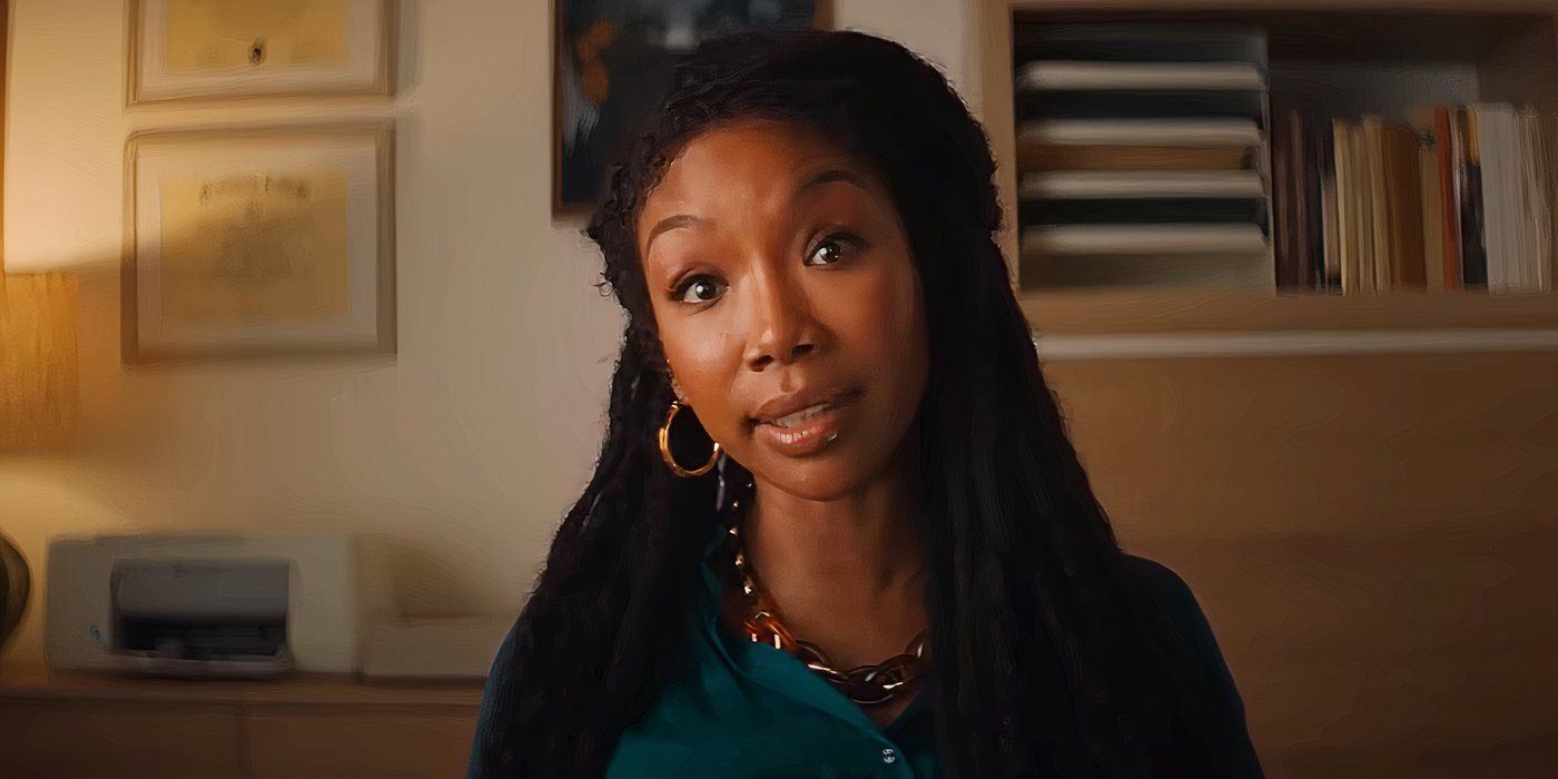 Brandy Norwood sitting opposite someone and talking to them in The Front Room