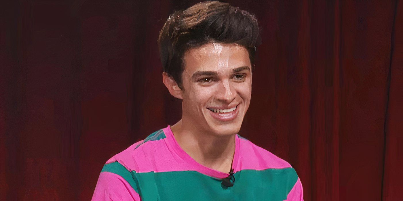 Brent Rivera in front of a red curtain