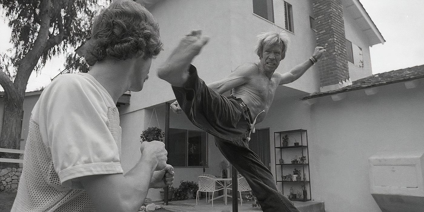 Chuck Norris kicking his opponent