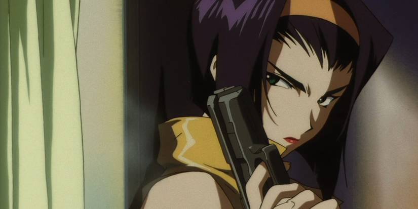 Faye stands behind a wall, her gun at the ready, as she prepares to surprise someone.