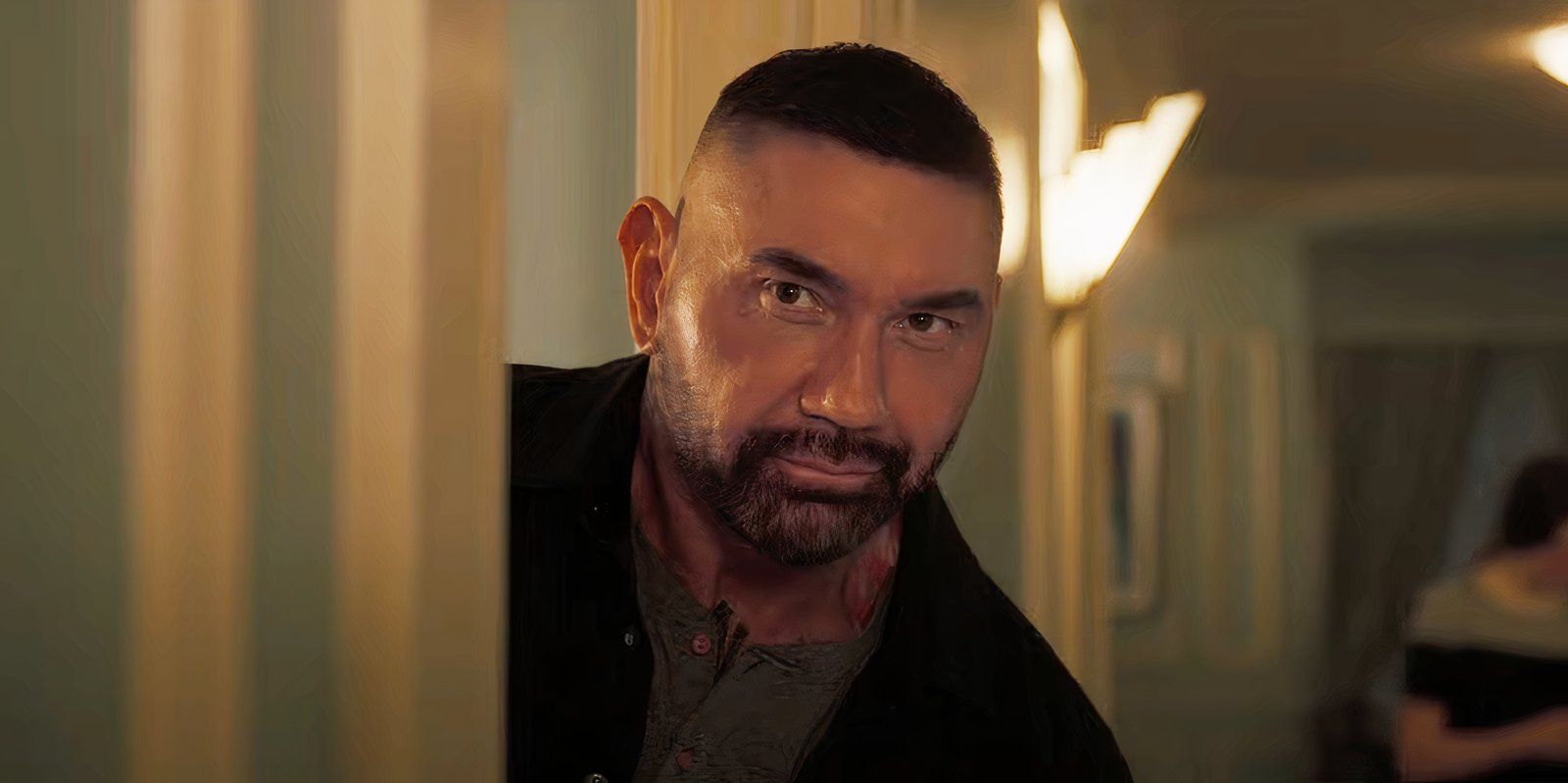 Dave Bautista smirking as JJ in My Spy The Eternal City