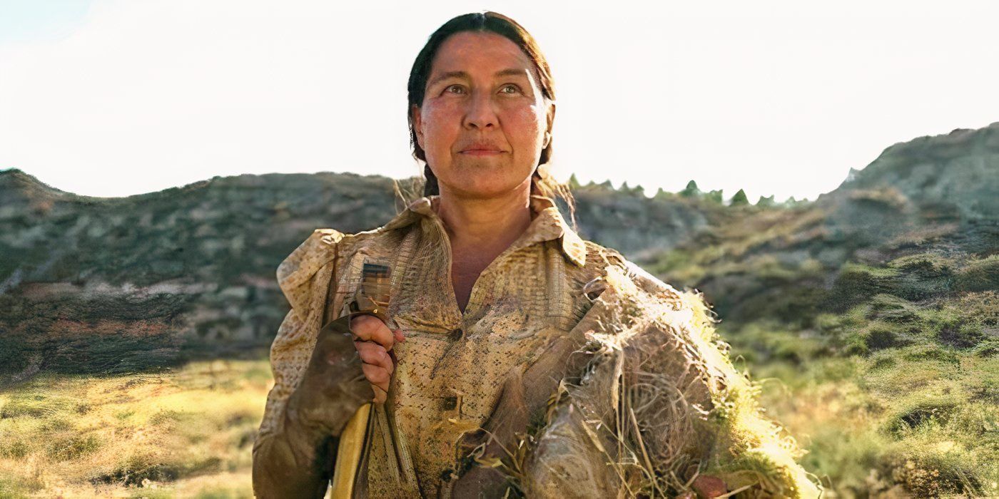 Kimberly Guerrero looks up while standing in a field 