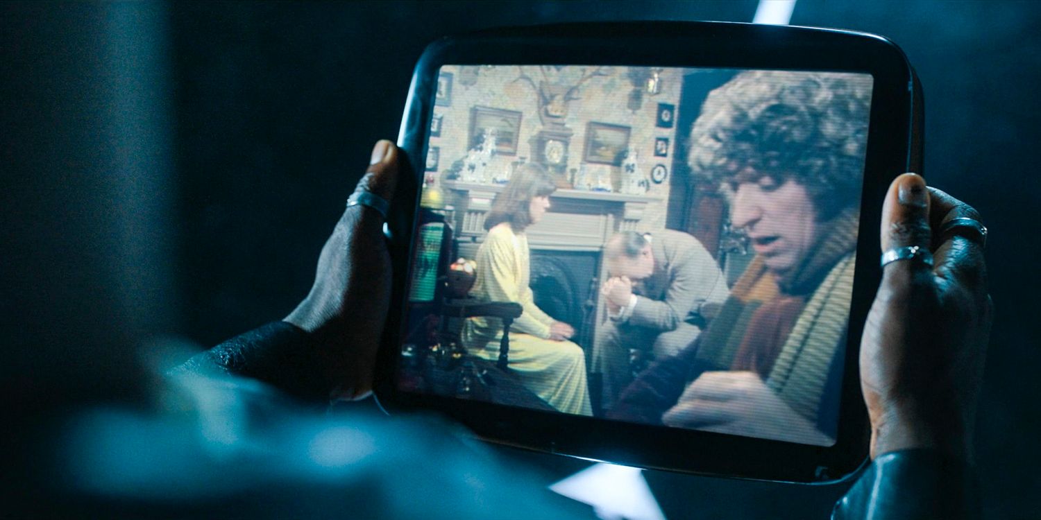 The Doctor holding a screen with memories in Doctor Who season 14 episode 8
