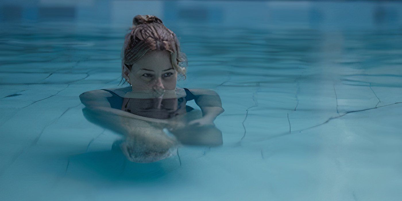 Elizabeth Banks as Liz swims in the pool in A Mistake movie still