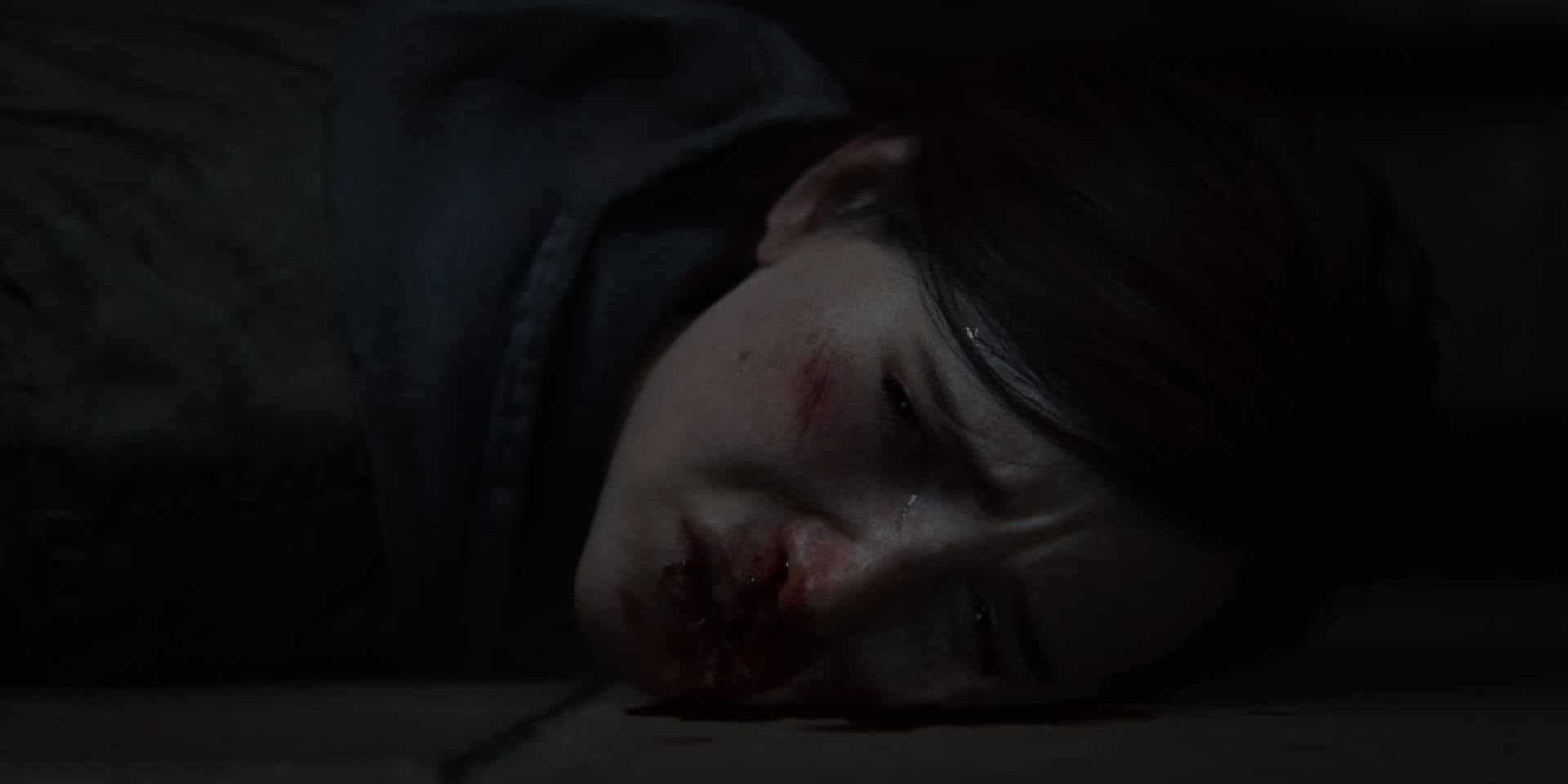 Ellie looking heartbroken in The Last of Us Part II