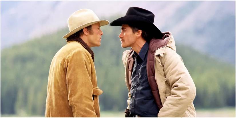 Ennis Del Mar (Heath Ledger) and Jack Twist (Jake Gyllenhaal) angrily staring at each other in Brokeback Mountain