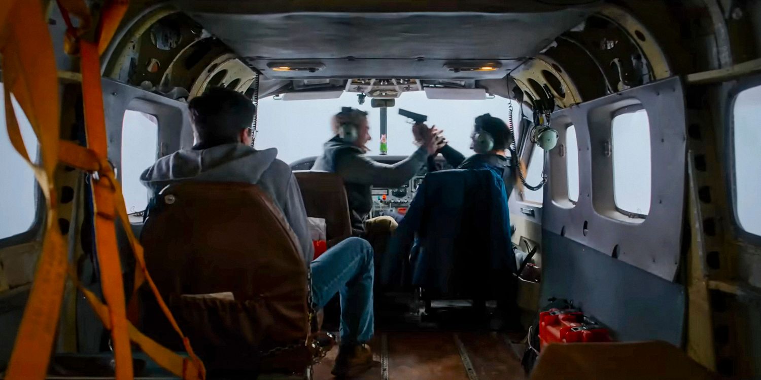 A woman pointing a gun a pilot in Flight Risk