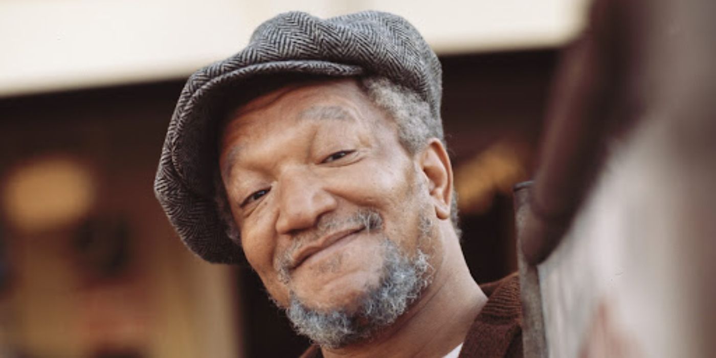 Fred Sanford (Redd Foxx) smiling in Sanford and Son.-1